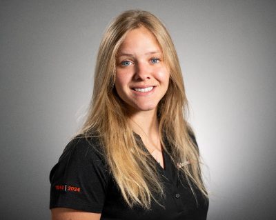 Catherine Caputo with long blonde hair in black shirt