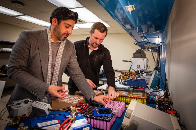 Faculty member and student working together in a lab