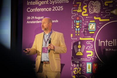 Stephen Adams, assistant director of the Virginia Tech National Security Institute's Intelligent Systems Division, presents at the IntelliSys Conference in Amsterdam. Photo courtesy of Intellisys. 