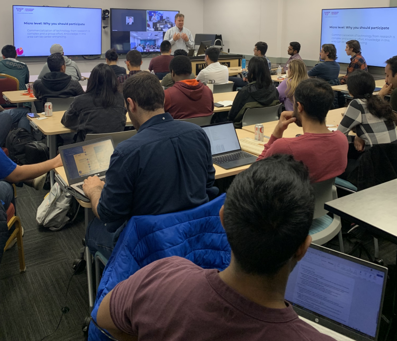 A group of scholars learns about cyber innovation pathways to commercialization.